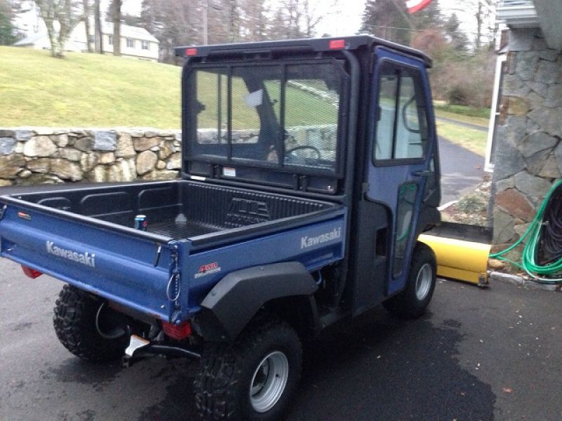 2010 Kawasaki Mule 4010 4X4 with cab and plow