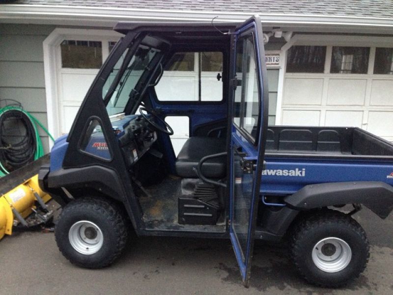 2010 Kawasaki Mule 4010 4X4 with cab and plow