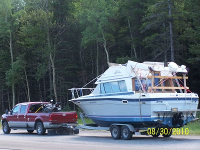 WE MOVE TRAILERS , BOATS AND EQUIPMENT !!!